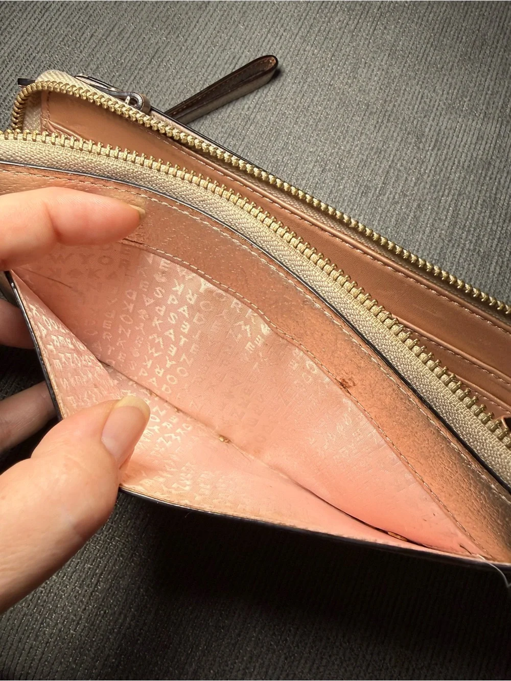 Kate spade Metallic Rose Gold Wristlet Wallet with Zip Closure